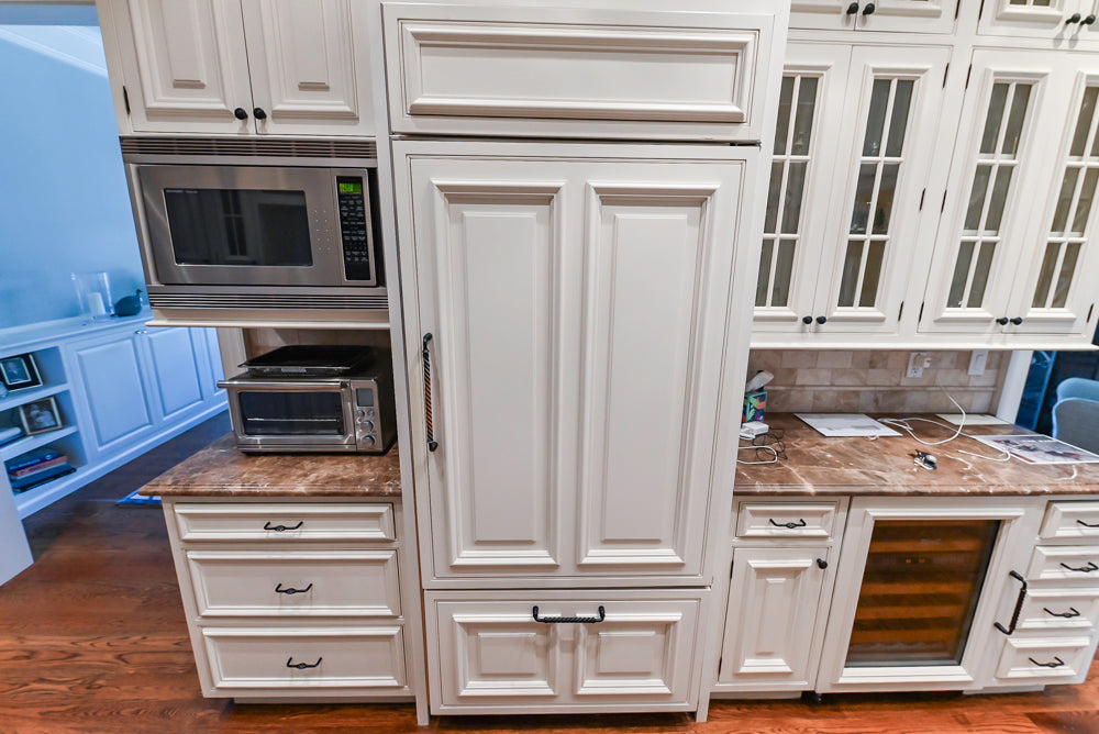 Quakermaid Traditional White Kitchen with Marble Countertops and Luxe Appliances