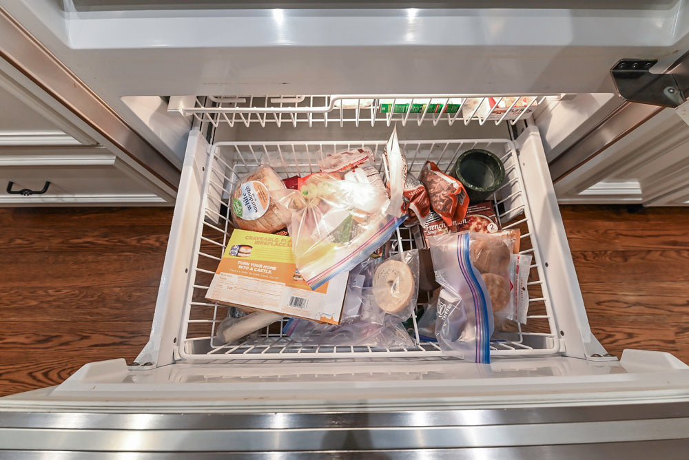 Quakermaid Traditional White Kitchen with Marble Countertops and Luxe Appliances