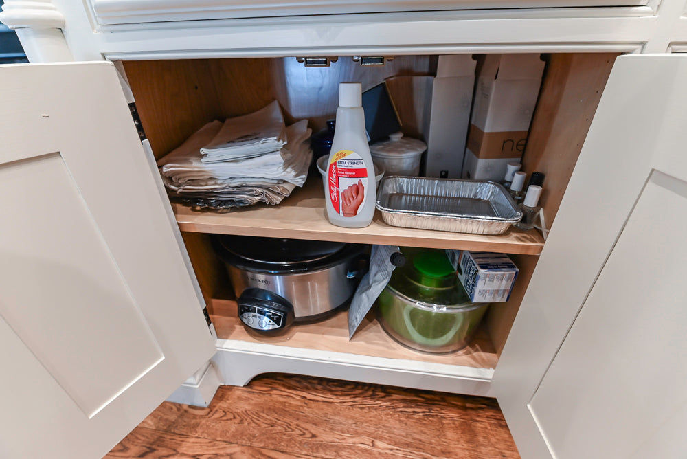 Quakermaid Traditional White Kitchen with Marble Countertops and Luxe Appliances
