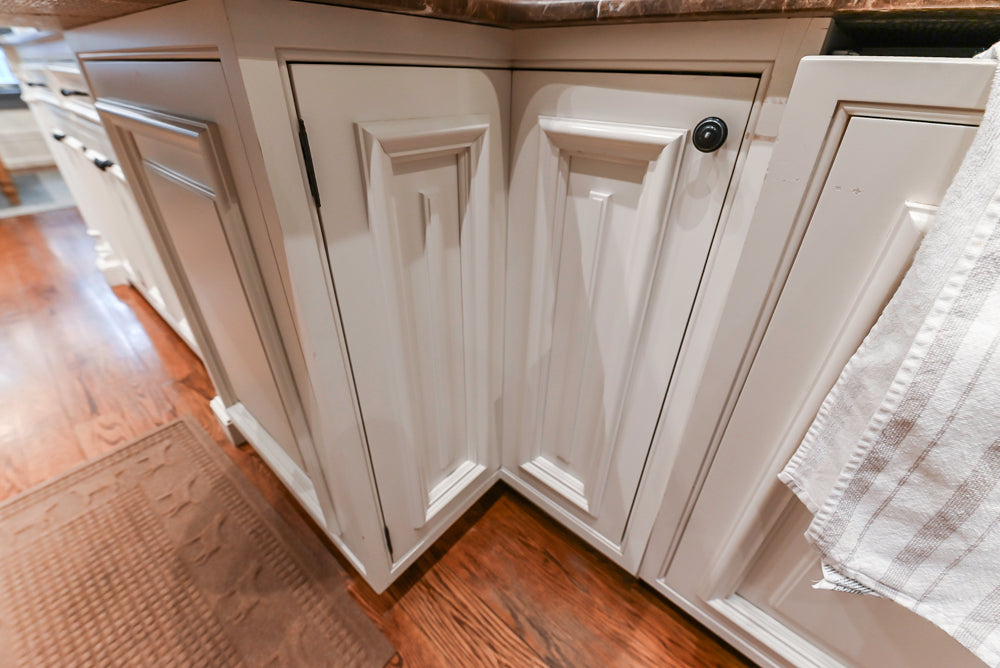 Quakermaid Traditional White Kitchen with Marble Countertops and Luxe Appliances