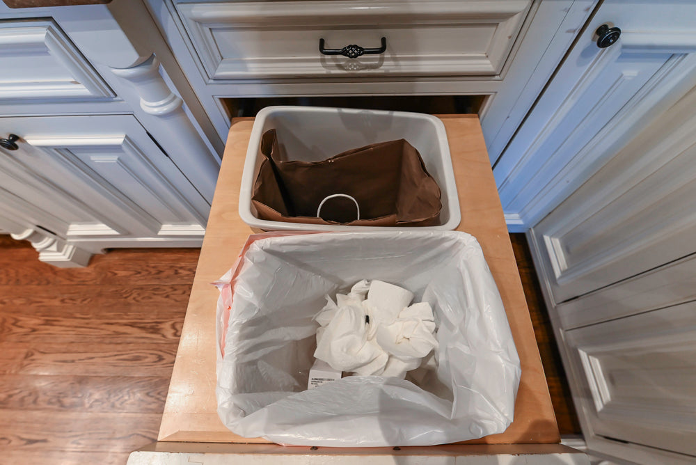 Quakermaid Traditional White Kitchen with Marble Countertops and Luxe Appliances