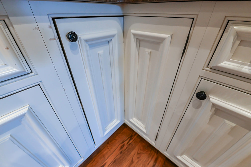 Quakermaid Traditional White Kitchen with Marble Countertops and Luxe Appliances