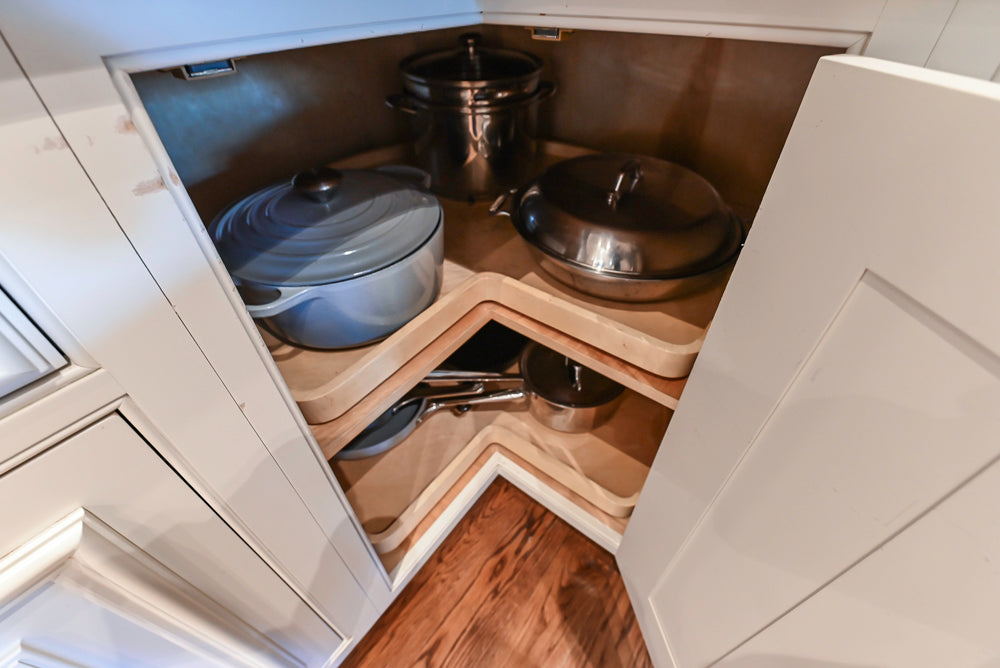 Quakermaid Traditional White Kitchen with Marble Countertops and Luxe Appliances
