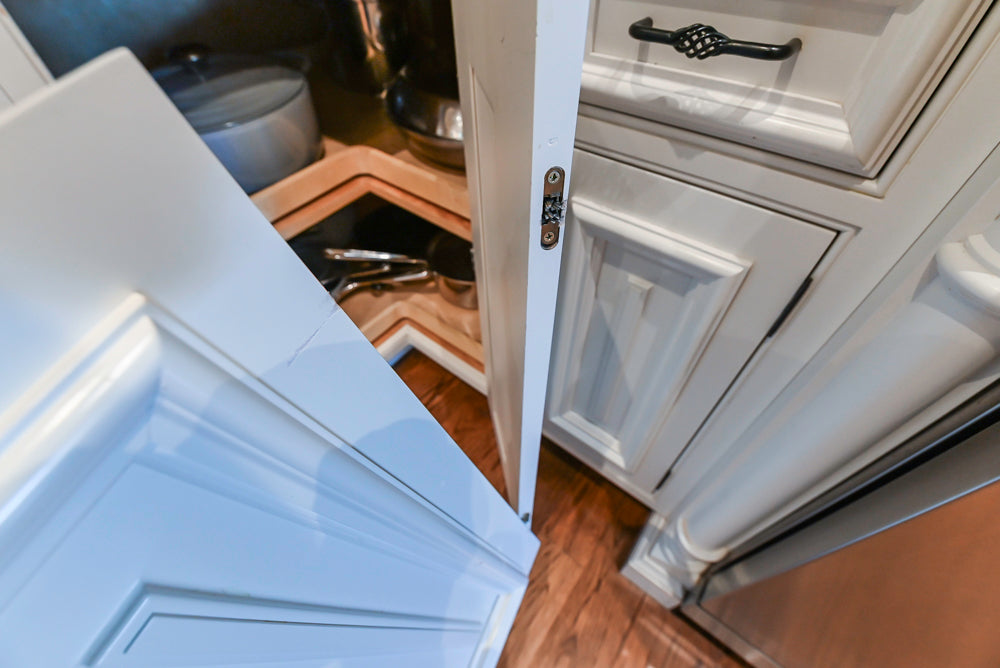 Quakermaid Traditional White Kitchen with Marble Countertops and Luxe Appliances