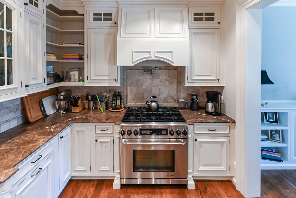 Quakermaid Traditional White Kitchen with Marble Countertops and Luxe Appliances