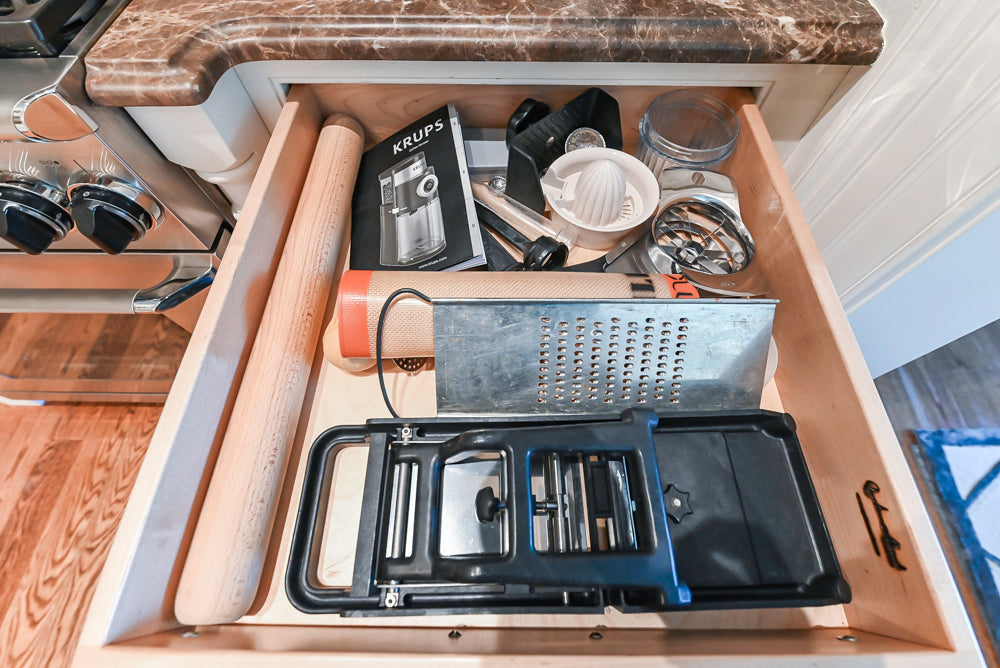 Quakermaid Traditional White Kitchen with Marble Countertops and Luxe Appliances