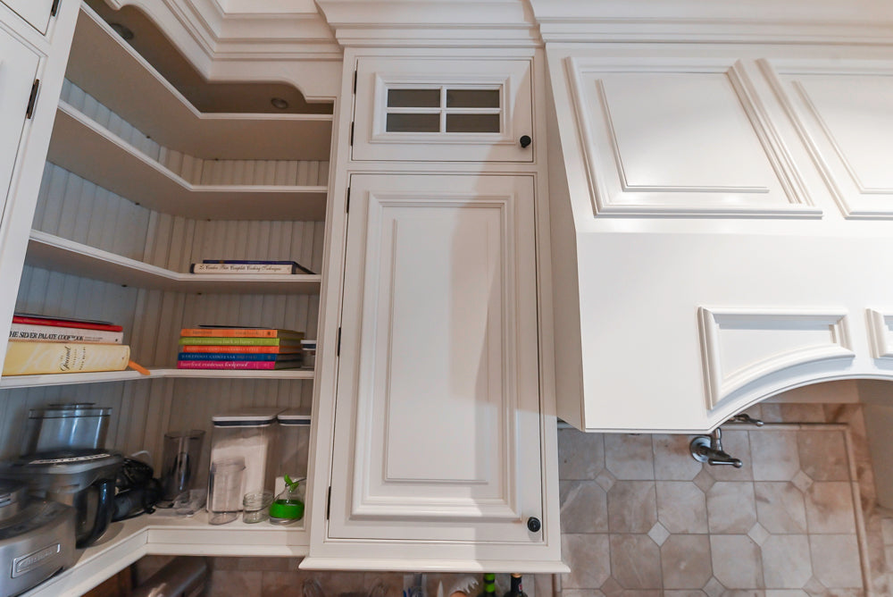 Quakermaid Traditional White Kitchen with Marble Countertops and Luxe Appliances
