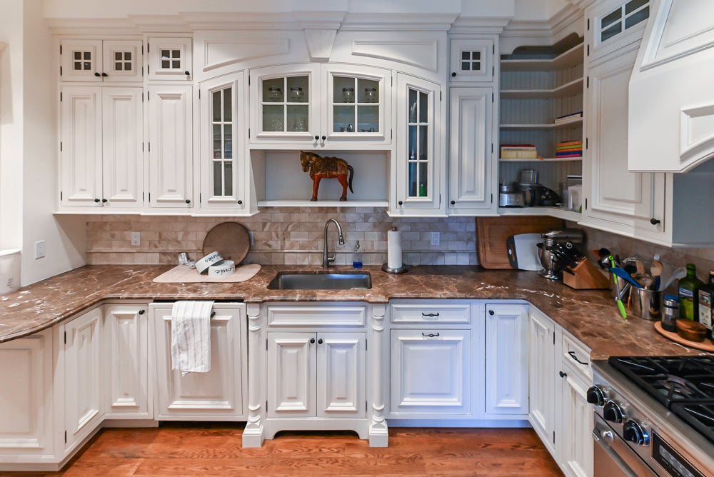 Quakermaid Traditional White Kitchen with Marble Countertops and Luxe Appliances