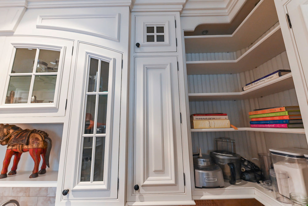 Quakermaid Traditional White Kitchen with Marble Countertops and Luxe Appliances