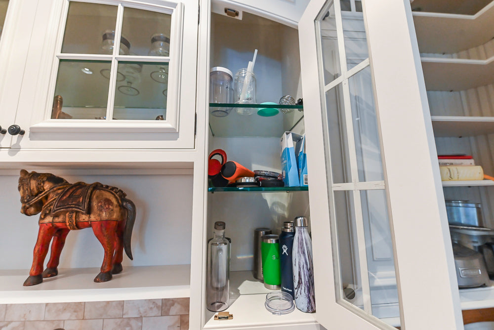 Quakermaid Traditional White Kitchen with Marble Countertops and Luxe Appliances