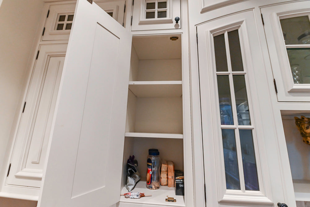 Quakermaid Traditional White Kitchen with Marble Countertops and Luxe Appliances