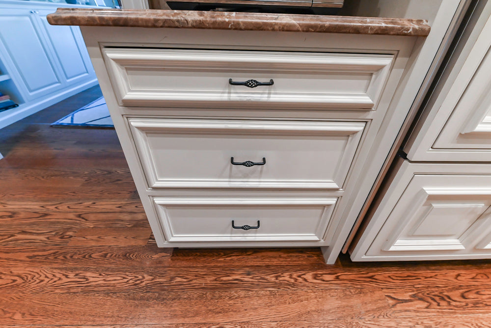 Quakermaid Traditional White Kitchen with Marble Countertops and Luxe Appliances