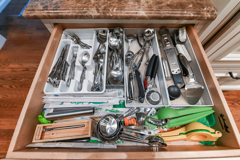 Quakermaid Traditional White Kitchen with Marble Countertops and Luxe Appliances