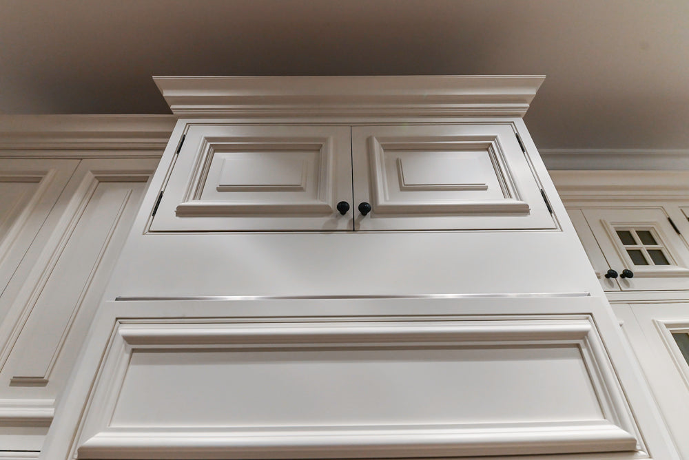 Quakermaid Traditional White Kitchen with Marble Countertops and Luxe Appliances