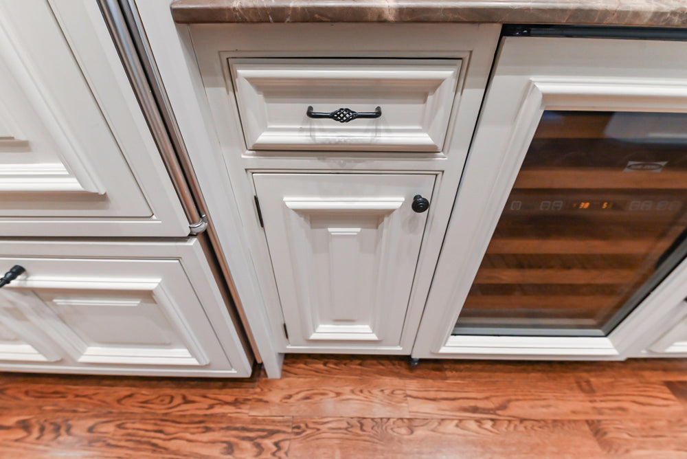 Quakermaid Traditional White Kitchen with Marble Countertops and Luxe Appliances