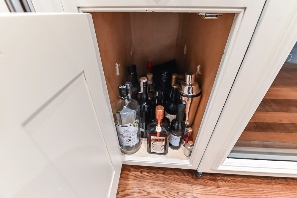 Quakermaid Traditional White Kitchen with Marble Countertops and Luxe Appliances