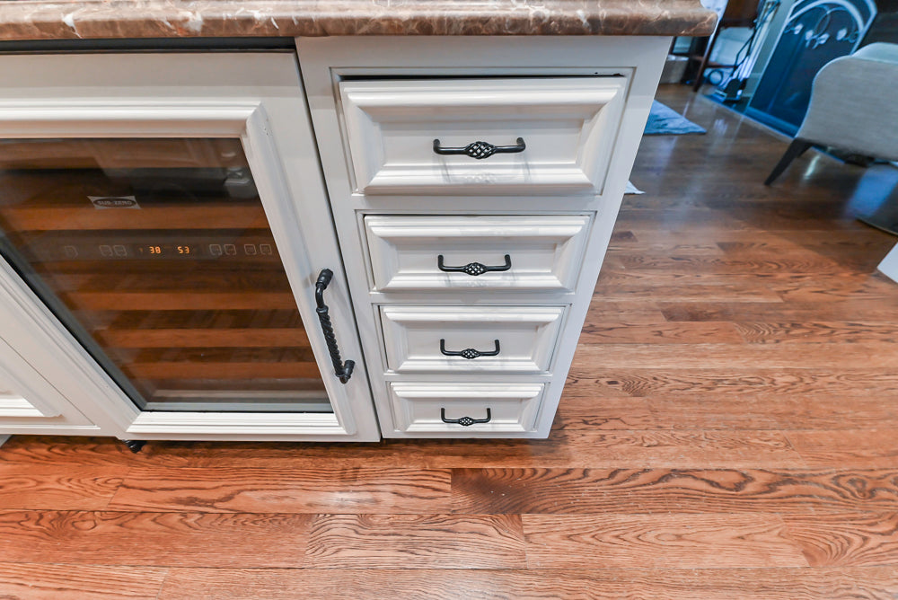 Quakermaid Traditional White Kitchen with Marble Countertops and Luxe Appliances