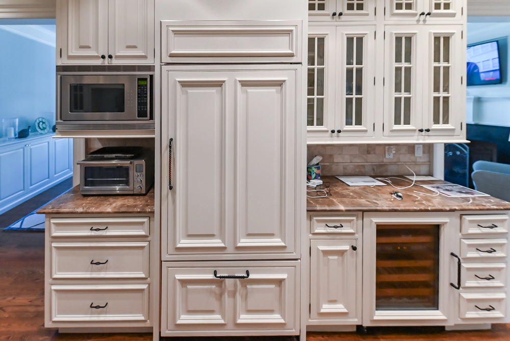 Quakermaid Traditional White Kitchen with Marble Countertops and Luxe Appliances