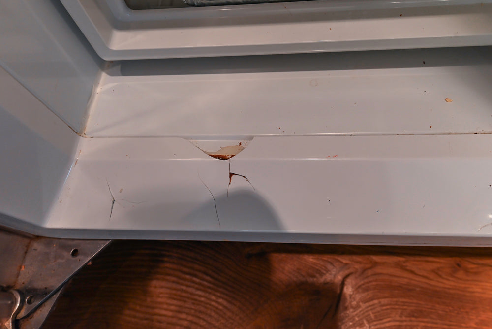 Wood-Mode Traditional Light Cream Kitchen with Marble Countertops and Wolf Range