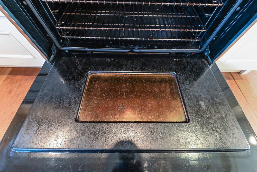 Wood-Mode Traditional Light Cream Kitchen with Marble Countertops and Wolf Range