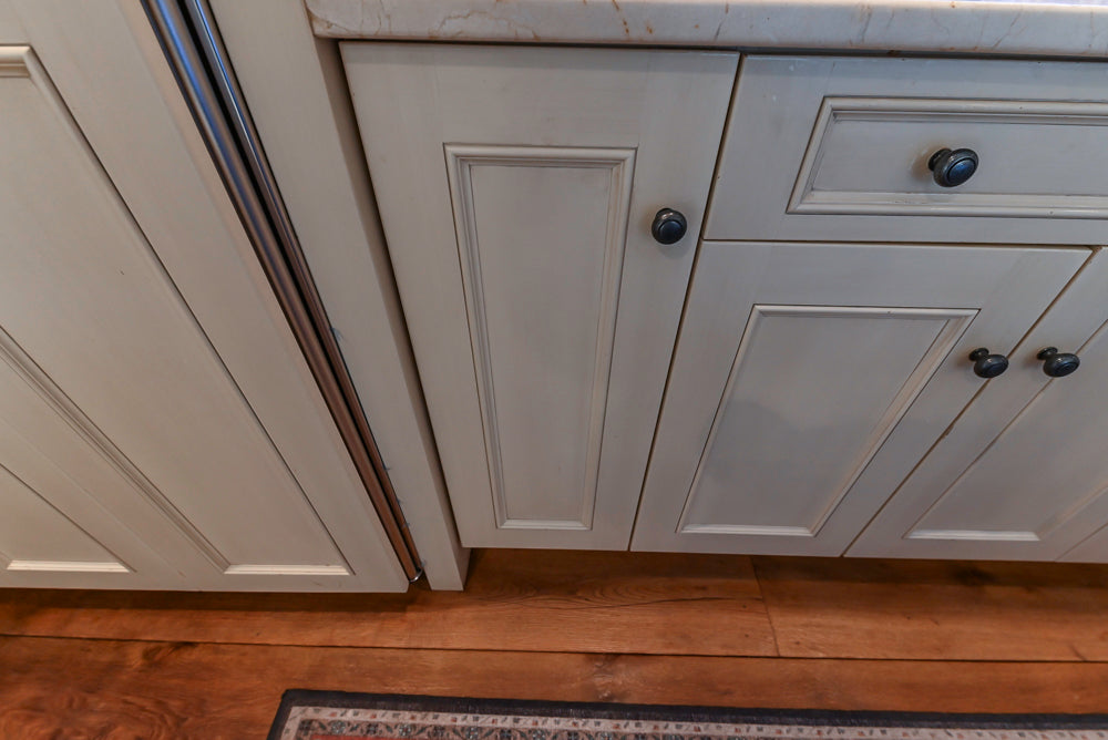 Wood-Mode Traditional Light Cream Kitchen with Marble Countertops and Wolf Range