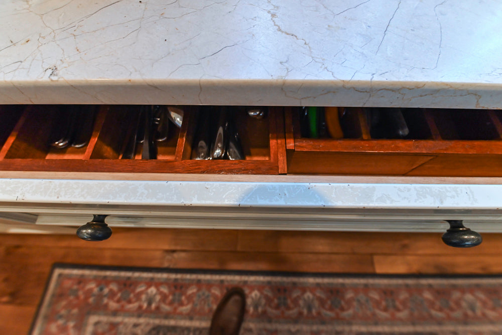 Wood-Mode Traditional Light Cream Kitchen with Marble Countertops and Wolf Range