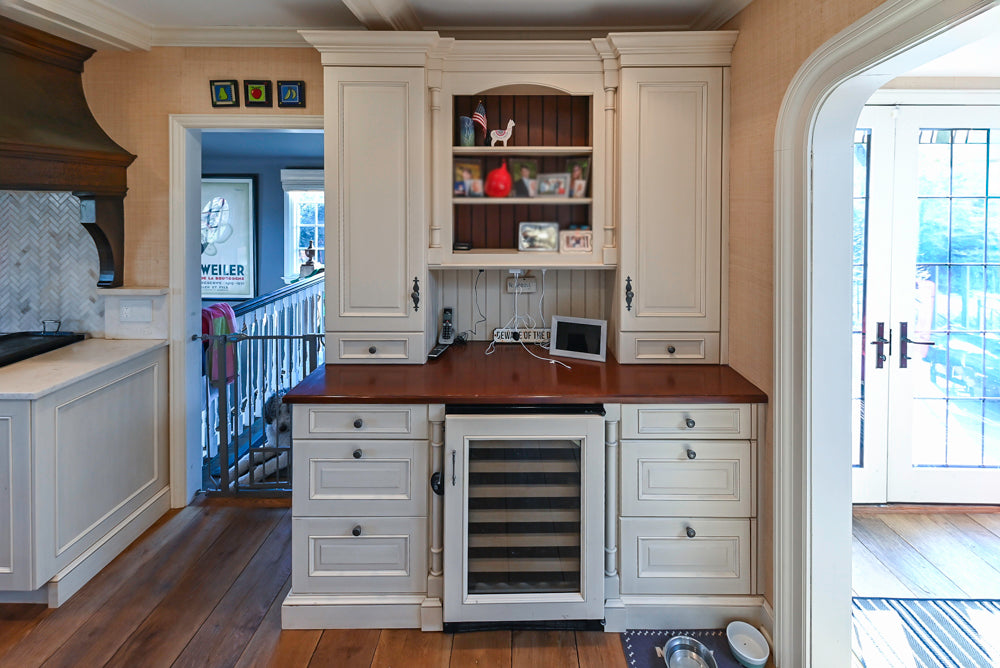 Wood-Mode Traditional Light Cream Kitchen with Marble Countertops and Wolf Range