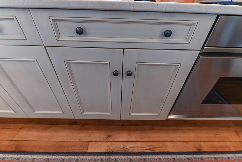 Wood-Mode Traditional Light Cream Kitchen with Marble Countertops and Wolf Range