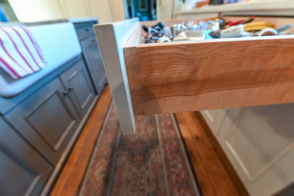 Wood-Mode Traditional Light Cream Kitchen with Marble Countertops and Wolf Range