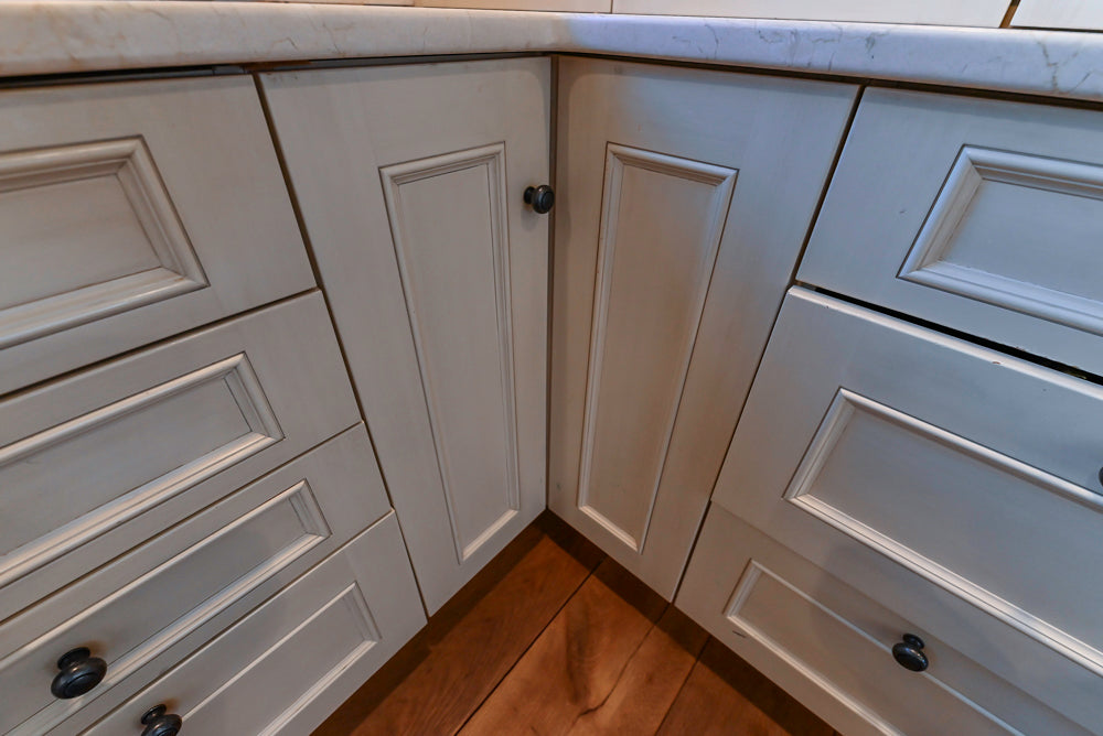 Wood-Mode Traditional Light Cream Kitchen with Marble Countertops and Wolf Range