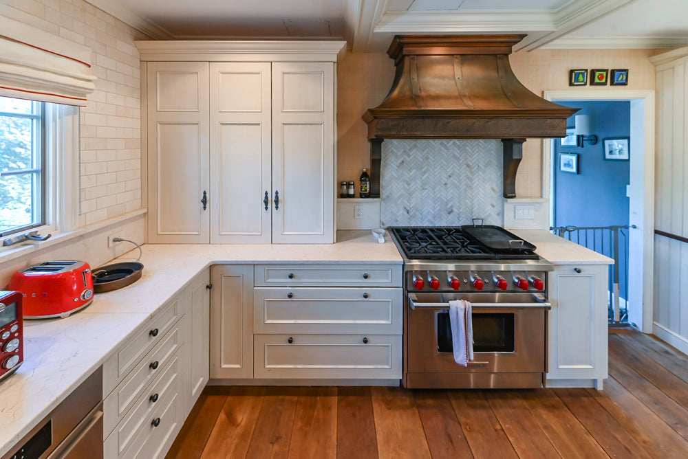 Wood-Mode Traditional Light Cream Kitchen with Marble Countertops and Wolf Range