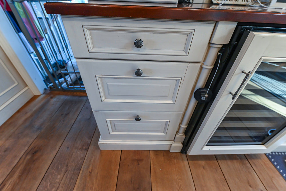 Wood-Mode Traditional Light Cream Kitchen with Marble Countertops and Wolf Range