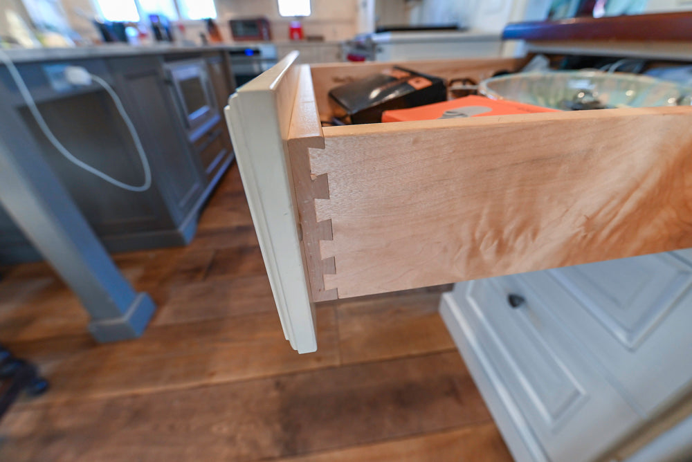 Wood-Mode Traditional Light Cream Kitchen with Marble Countertops and Wolf Range
