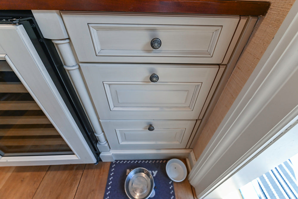Wood-Mode Traditional Light Cream Kitchen with Marble Countertops and Wolf Range