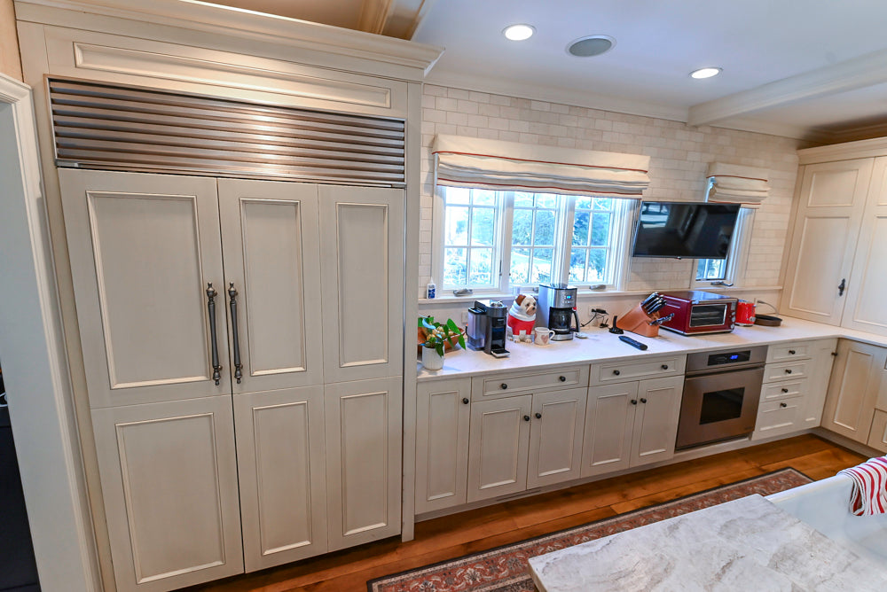 Wood-Mode Traditional Light Cream Kitchen with Marble Countertops and Wolf Range