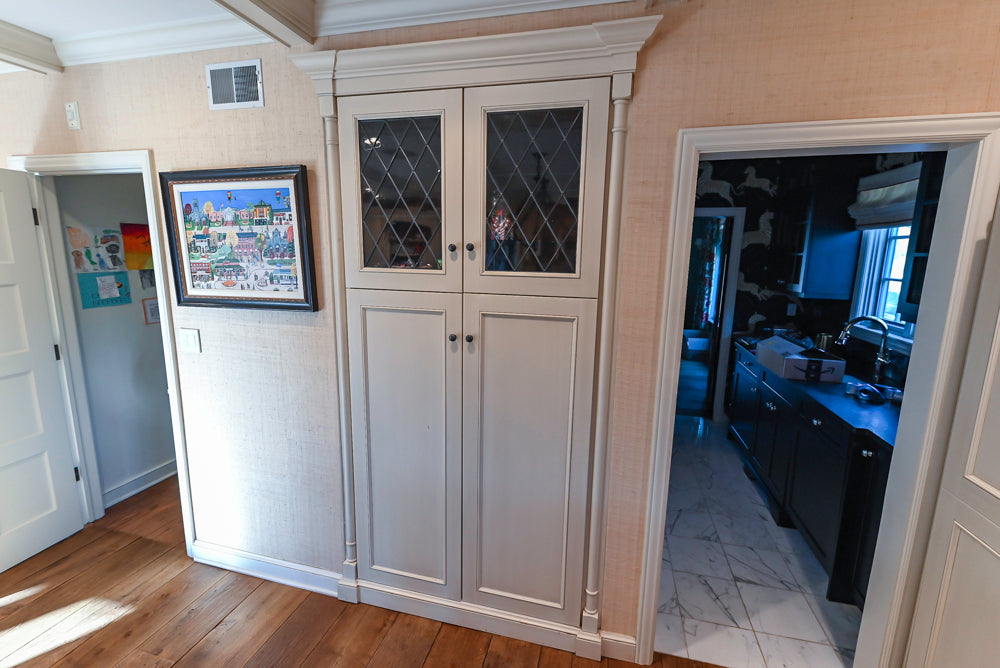 Wood-Mode Traditional Light Cream Kitchen with Marble Countertops and Wolf Range