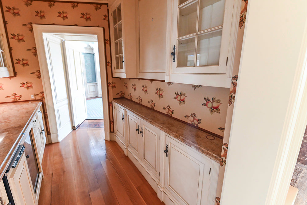 Christopher Peacock Traditional Cream Butler's Pantry with Granite Countertops & Sub-Zero Wine Coolers