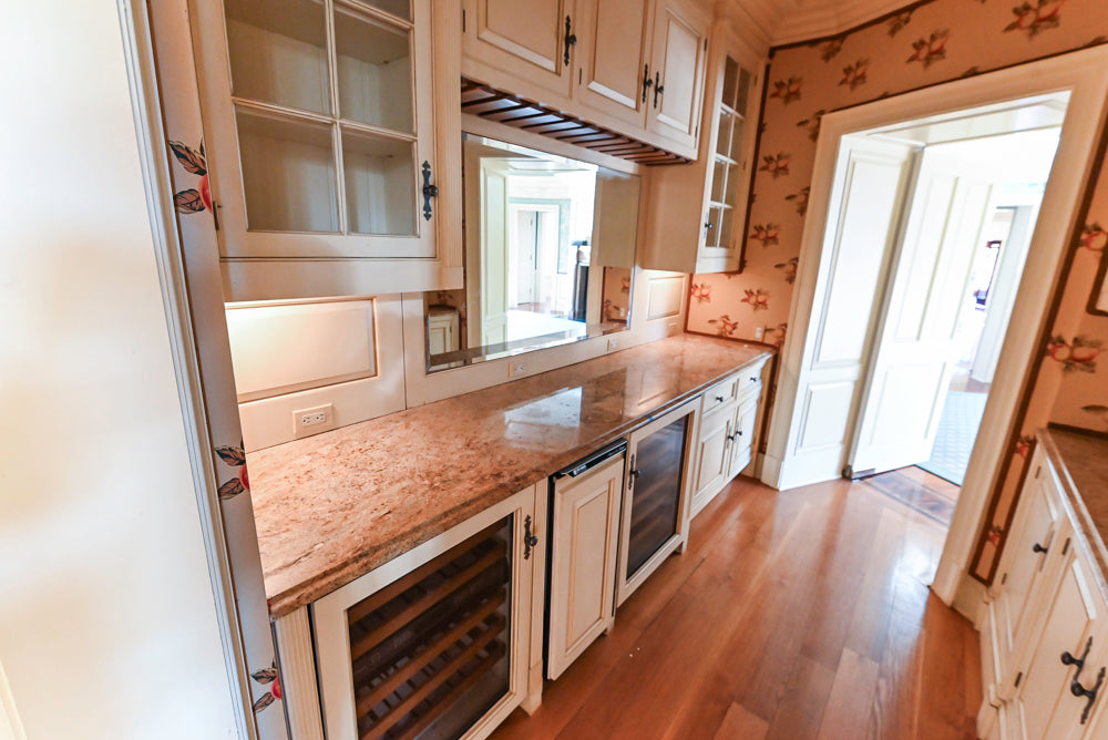 Christopher Peacock Traditional Cream Butler's Pantry with Granite Countertops & Sub-Zero Wine Coolers