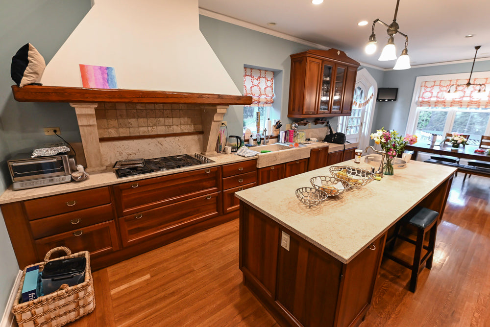 Transitional Wooden Kitchen with Island, Stone Countertops and Miele Appliances