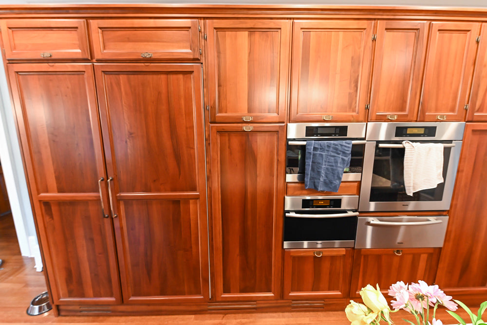 Transitional Wooden Kitchen with Island, Stone Countertops and Miele Appliances