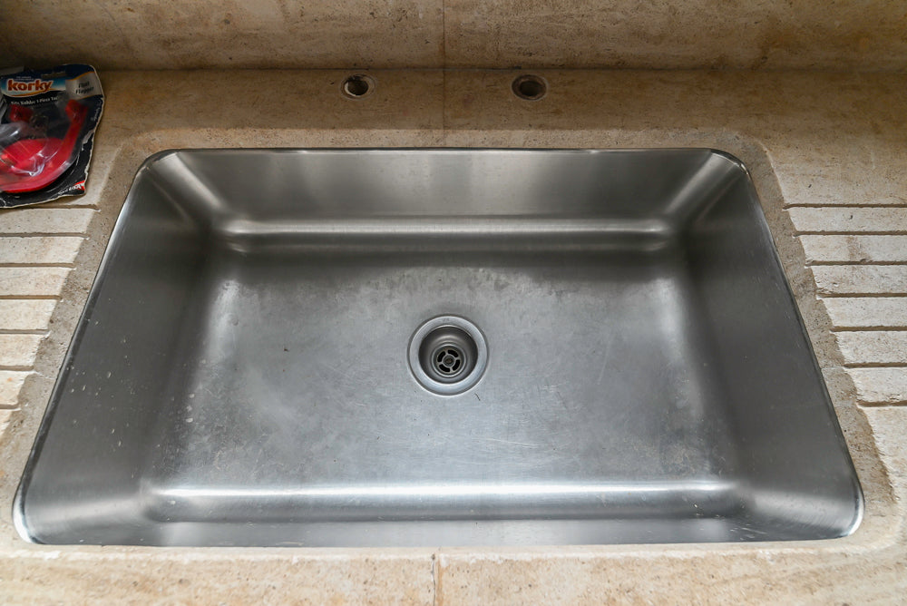 Traditional White Butler's Pantry with Stone Countertops and Built-In Sink