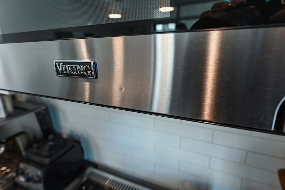 Imperia White Transitional Kitchen with Dark Grey Island, Marble & Stone Counters and Appliances