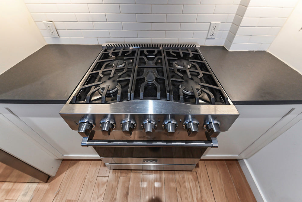 Imperia White Transitional Kitchen with Dark Grey Island, Marble & Stone Counters and Appliances