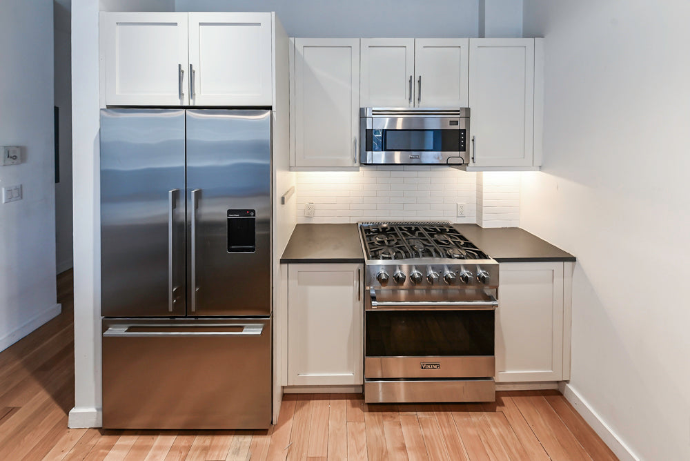 Imperia White Transitional Kitchen with Dark Grey Island, Marble & Stone Counters and Appliances