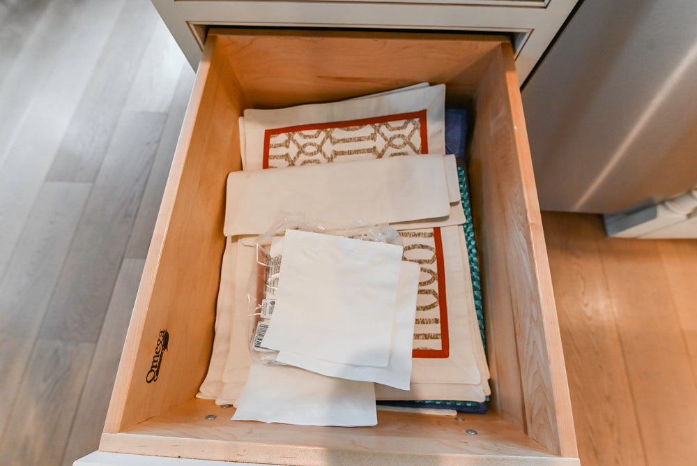 Omega Traditional Light Cream Kitchen with Island, Desk Area and Sub-Zero & Wolf Range