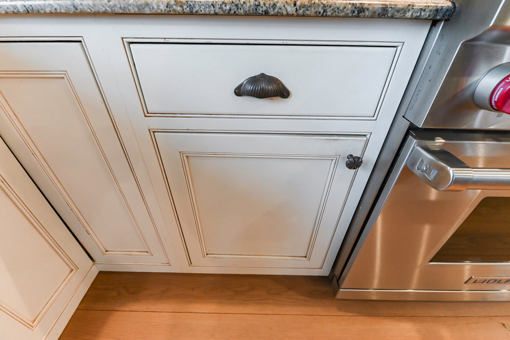 Omega Traditional Light Cream Kitchen with Island, Desk Area and Sub-Zero & Wolf Range