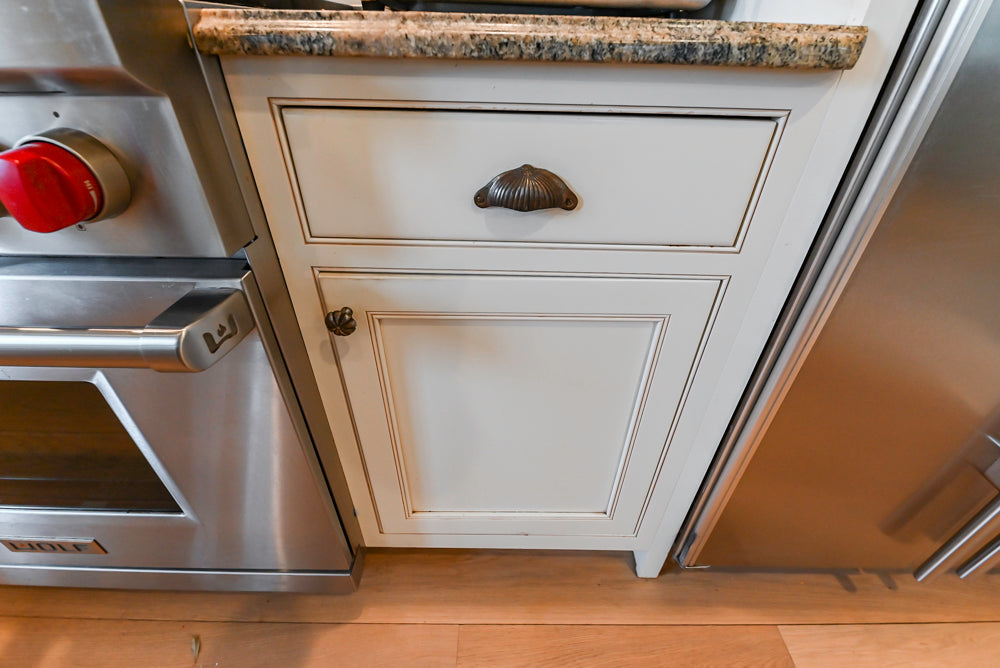 Omega Traditional Light Cream Kitchen with Island, Desk Area and Sub-Zero & Wolf Range