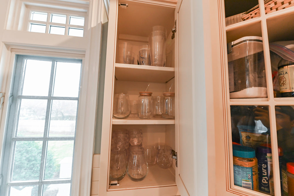 Omega Traditional Light Cream Kitchen with Island, Desk Area and Sub-Zero & Wolf Range