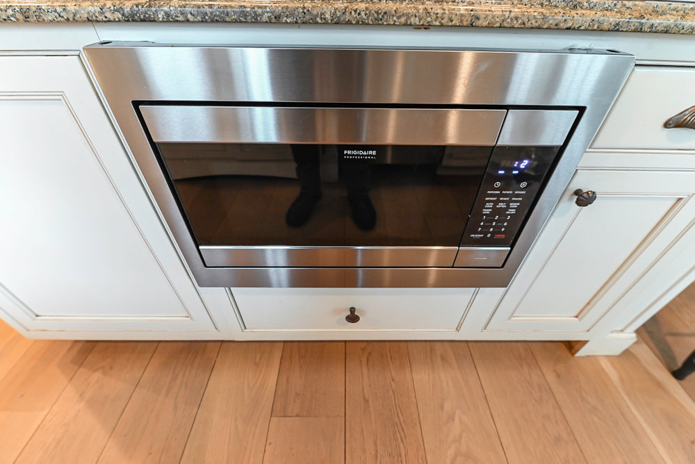Omega Traditional Light Cream Kitchen with Island, Desk Area and Sub-Zero & Wolf Range