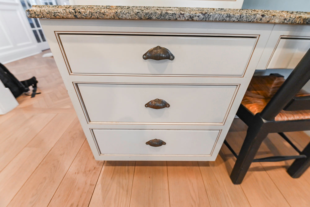 Omega Traditional Light Cream Kitchen with Island, Desk Area and Sub-Zero & Wolf Range